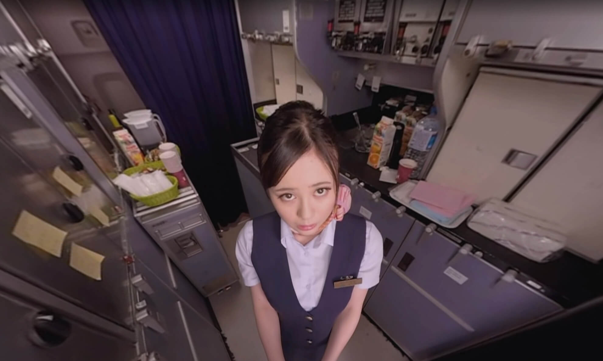 Brunette model teases in a flight attendant outfit during a VR POV blowjob and grinding scene produced by Dandy