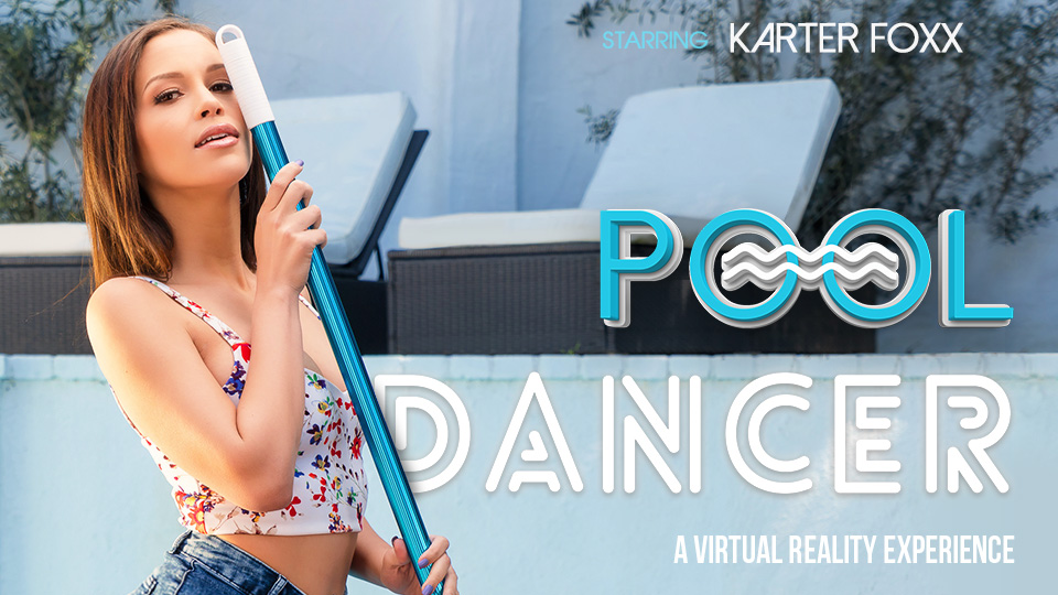 Karter Foxx performs a poolside blowjob in a VR POV scene featuring a brunette model in an outdoor setting.