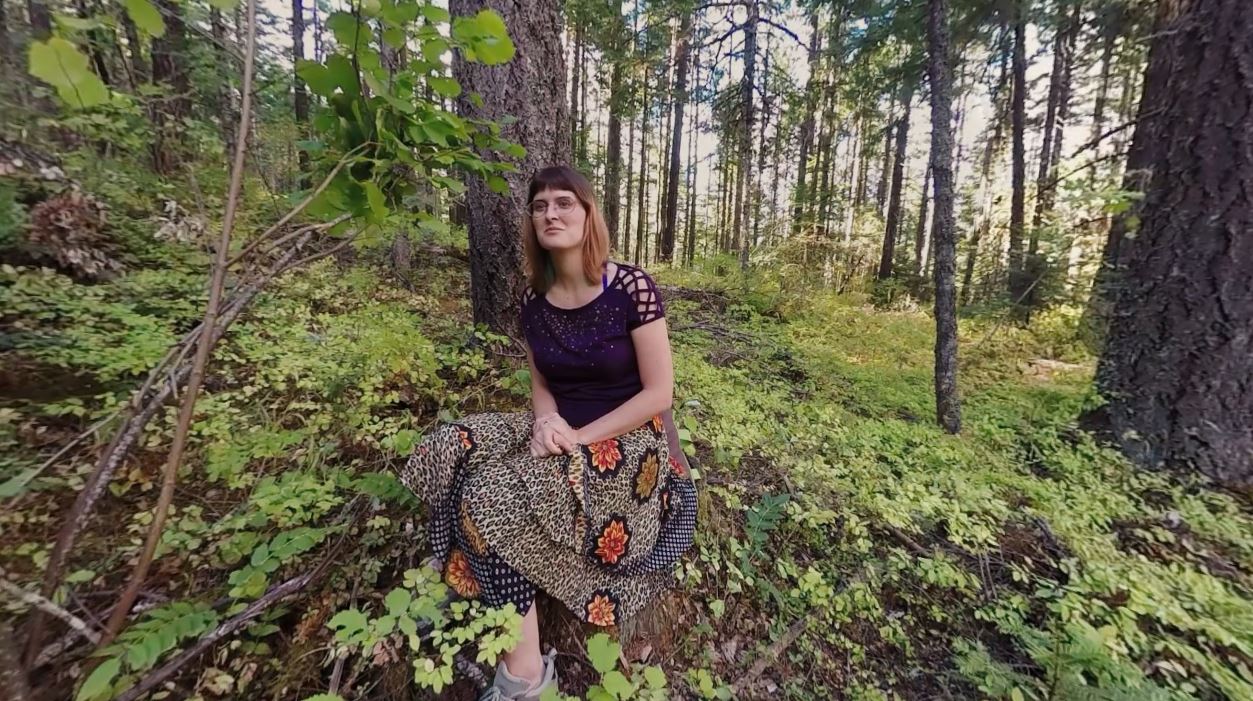 Sosha Belle poses outdoors in a solo softcore scene filmed in 60 FPS non-POV VR production by YanksVR.