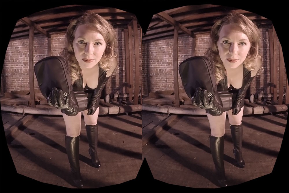 Mistress T in lingerie performs a solo chastity punishment scene in 4K VR.