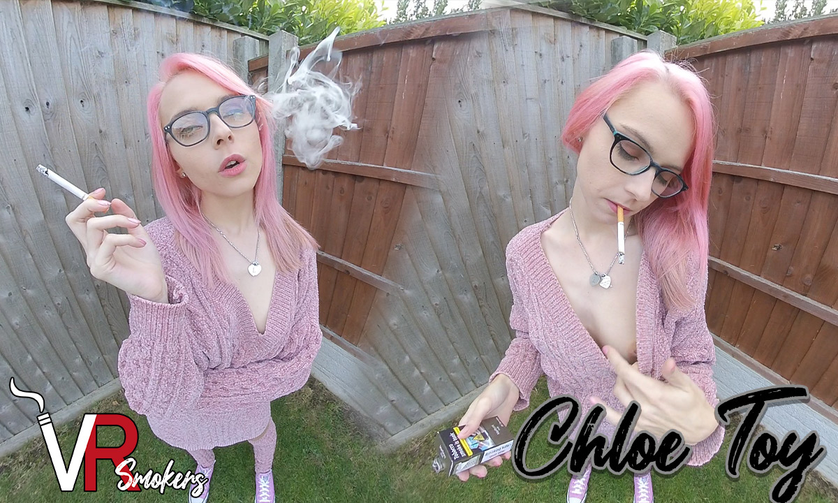 Chloe Toy smokes in an outdoor garden setting in a non-POV VR video produced by VR Smokers in 60 FPS.