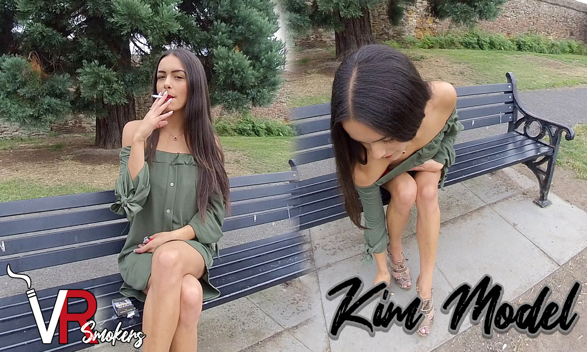 Kim Model sits on a park bench outdoors in a solo non POV VR scene produced by VR Smokers in 60 FPS premium quality.