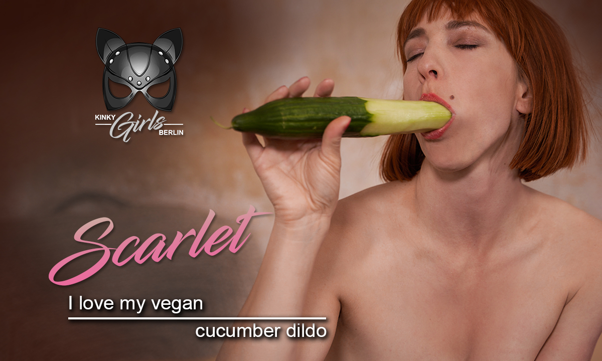 Redhead Scarlet poses solo with a vegan cucumber dildo in a 4K non-pov VR scene by KinkyGirlsBerlin