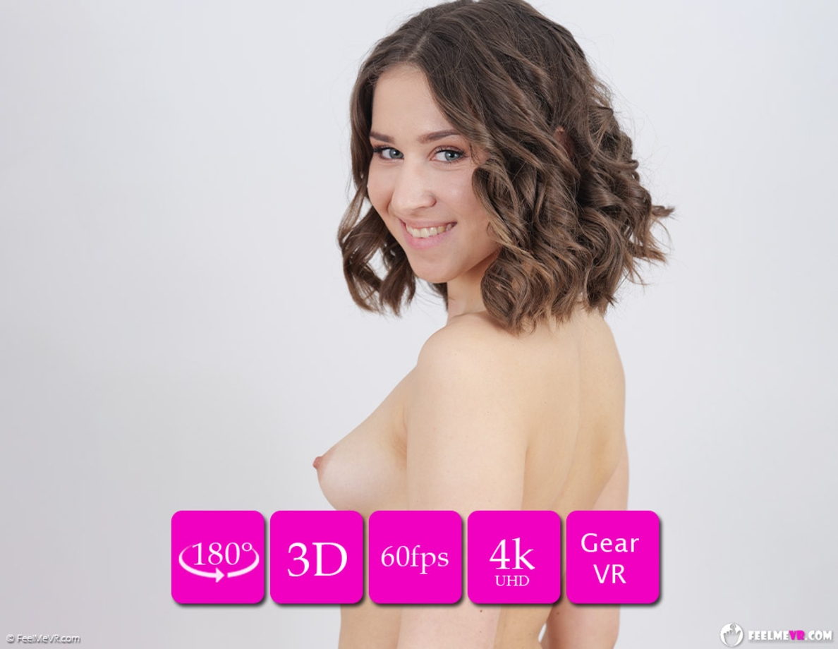 Gabriella Ella poses nude in a casting room during a solo VR 4K video filmed in 60 frames per second.