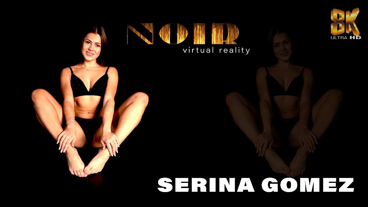 Brunette solo performer Serina Gomez in a dimly lit room captured in 4K VR POV footage with 60 FPS rendering.