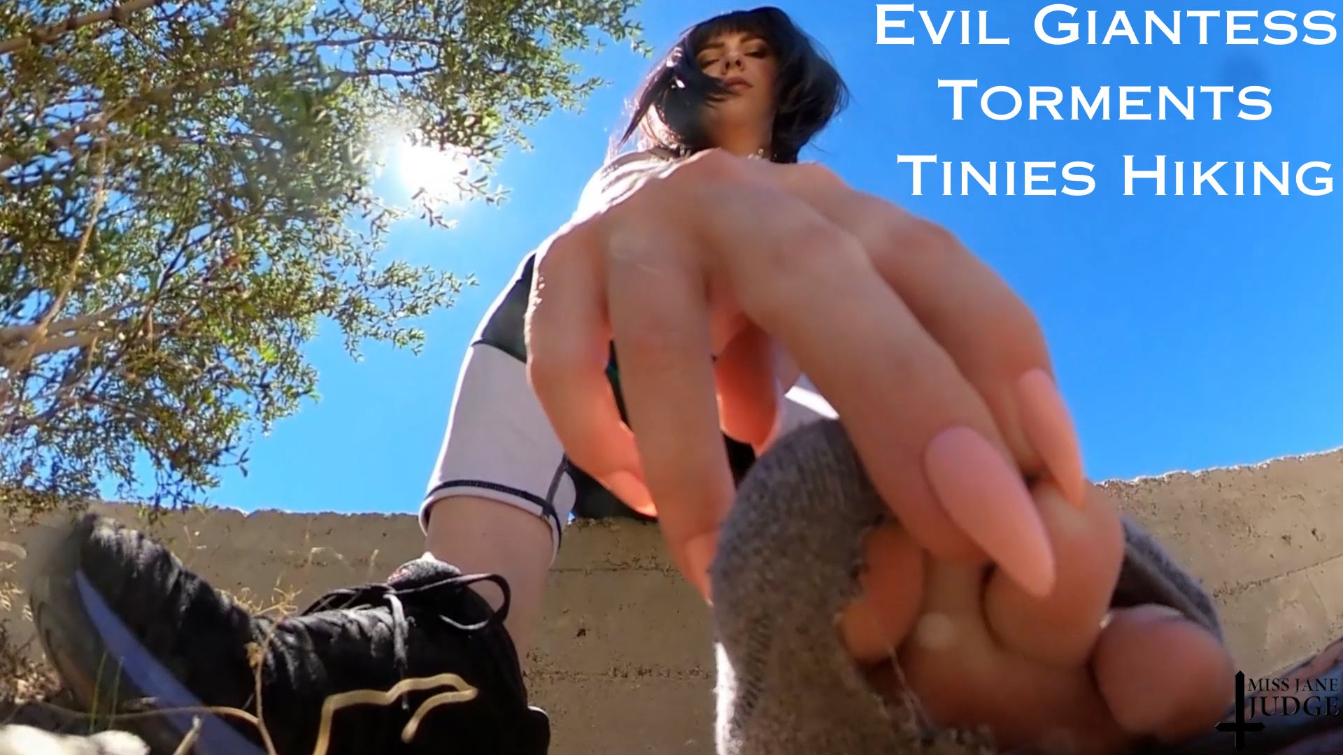 Jane Judge in an outdoor solo fetish scene as an evil giantess torments tiny figures in a 4K non-POV VR production.