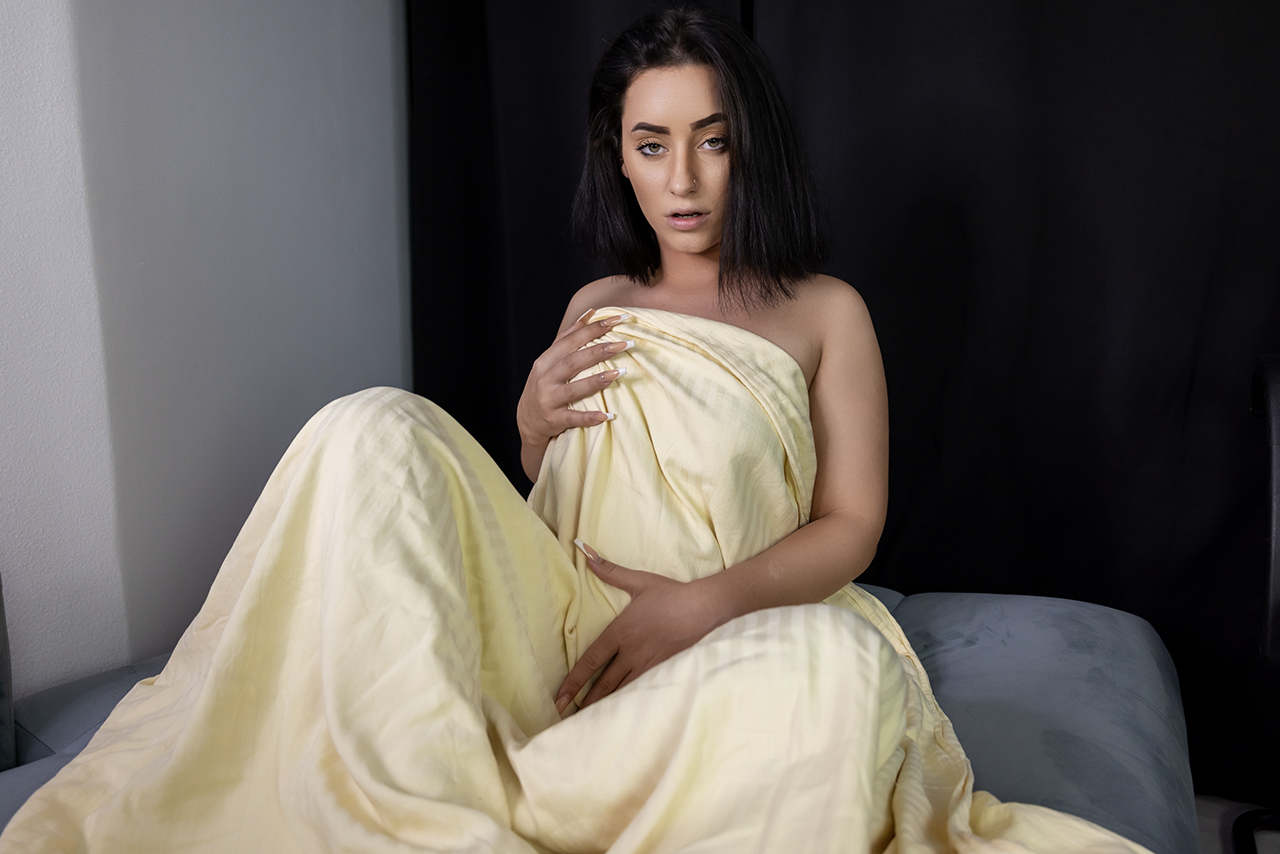 Brunette Olivia Hart performs a solo POV scene in 4K VR quality with 60 FPS smoothness for an immersive adult experience.