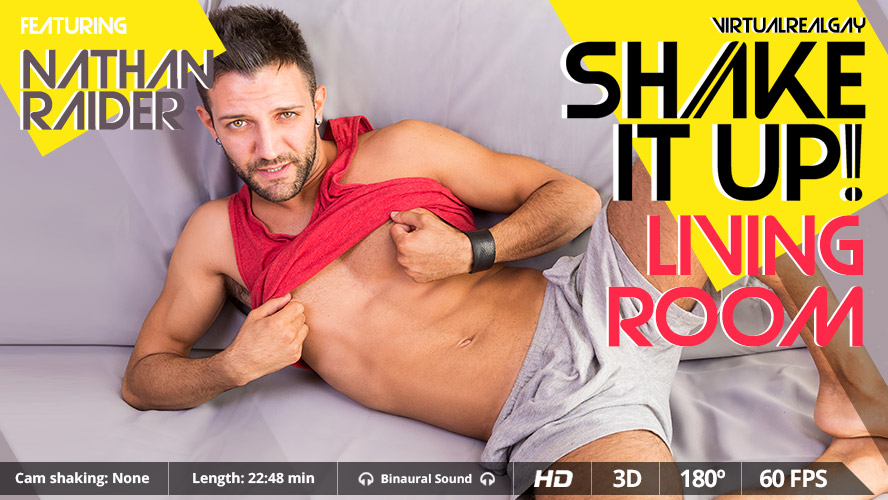 Nathan Raider performs a solo handjob in a living room setting for a 4K VR video from VirtualRealGay