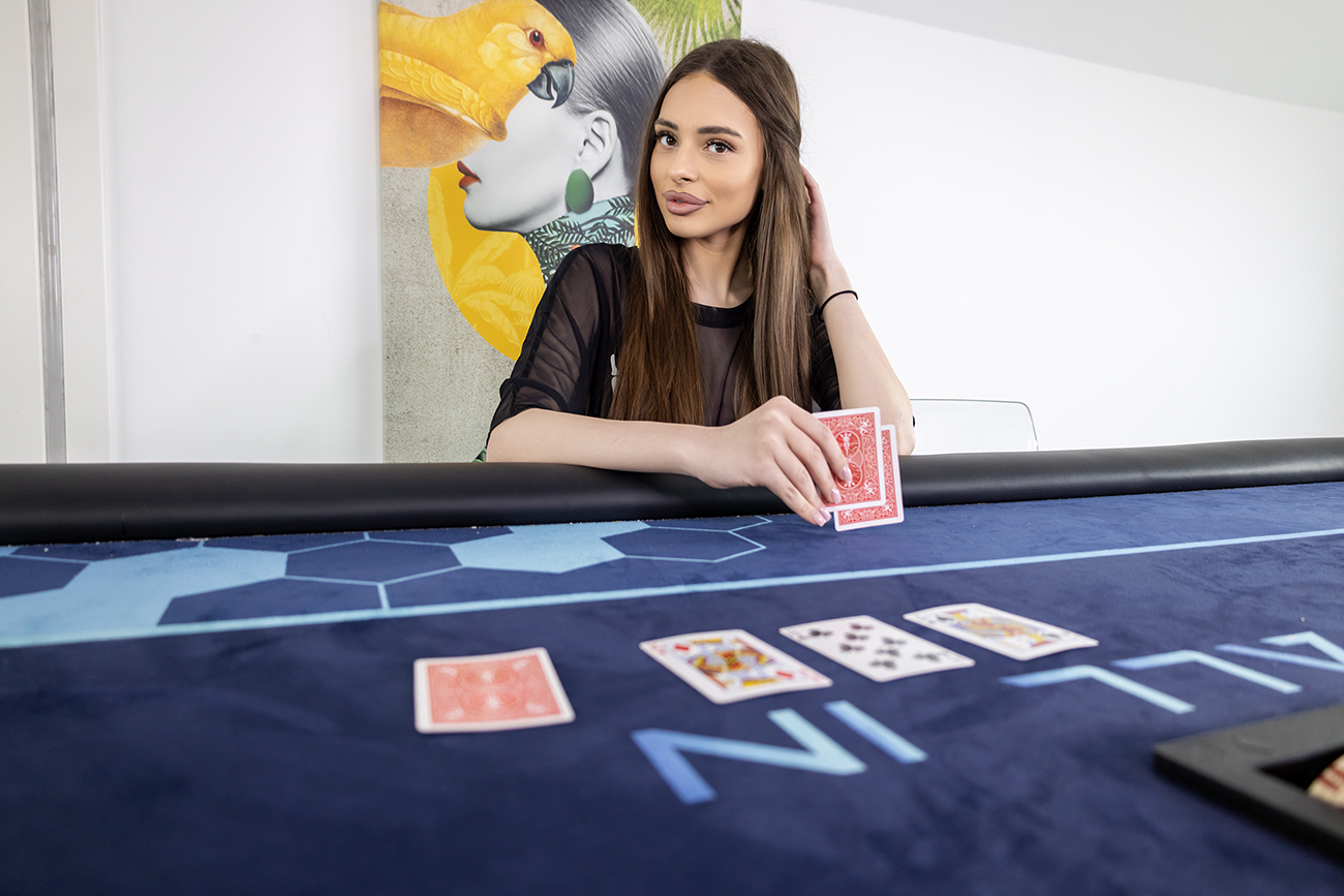 Bella Young plays solo poker in a POV VR scene filmed in 4K resolution at 60 frames per second for WoowVR