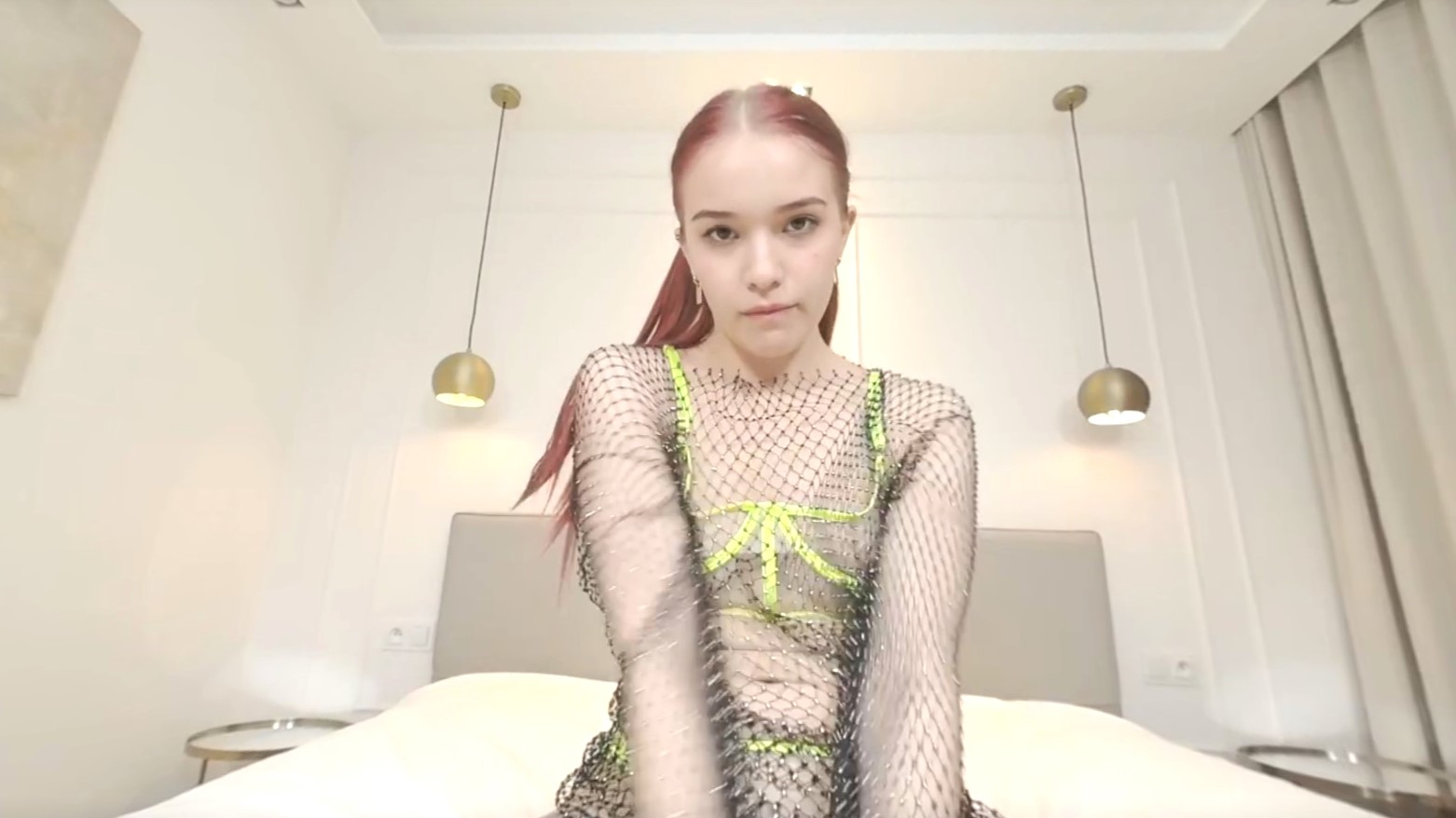 Redhead Wiki performs a slow seductive striptease in a solo VR POV scene produced by LIN VR in 4K quality.